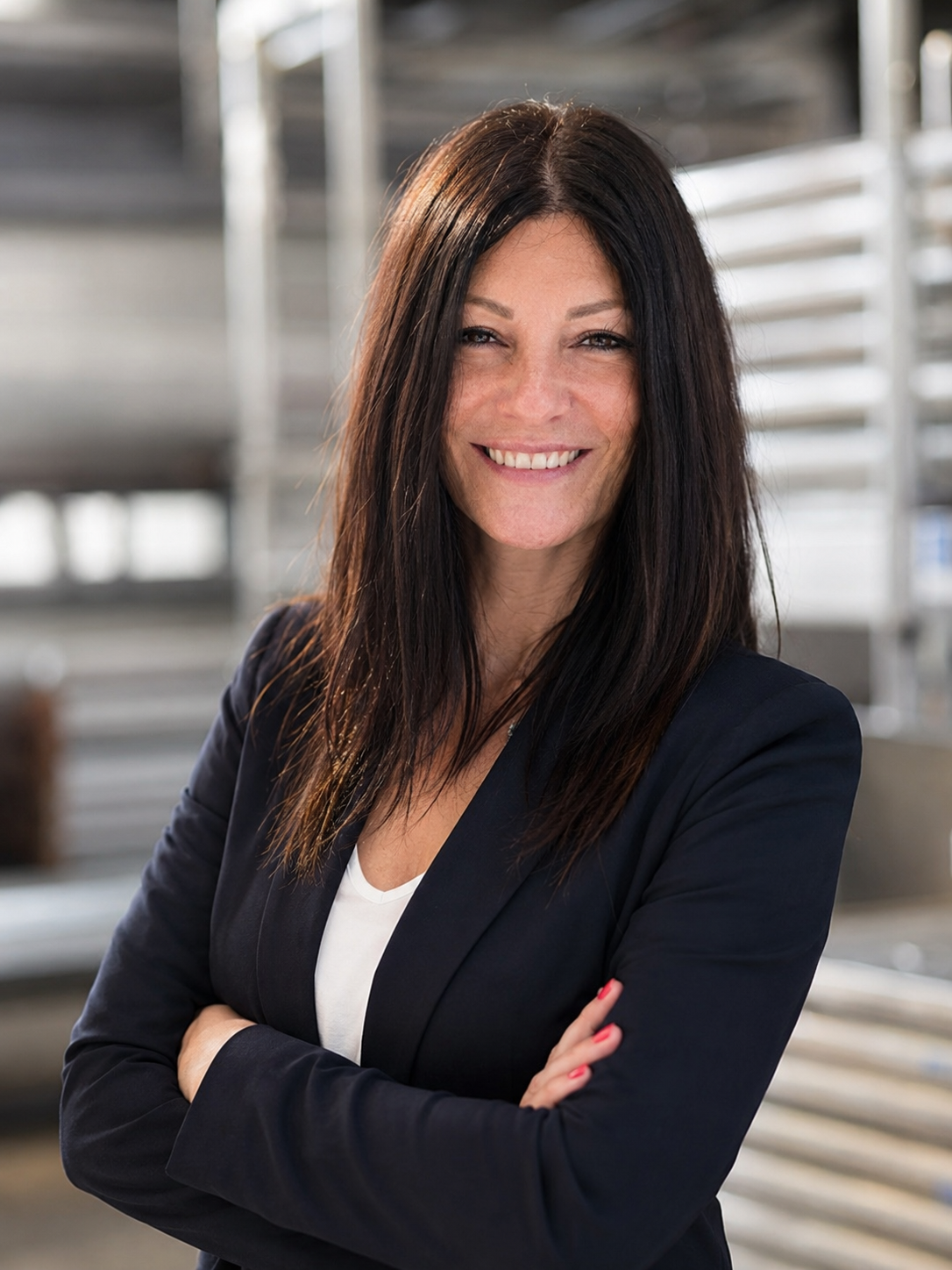 Nicole Asensi, Inhaberin von Profi Steigsysteme, Ansprechpartnerin für Rollgerüste, Fahrgerüste und professionelle Steigtechnik